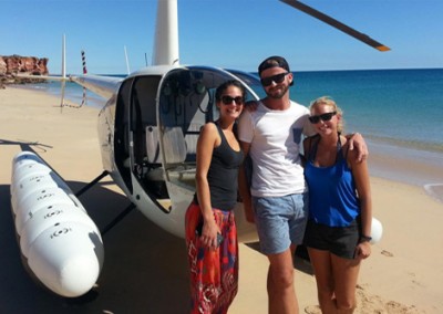 Friends enjoying a Scenic Helicopter Flight in Broome